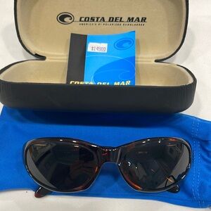 Women’s Costa Del Mar polarized sunglasses.
